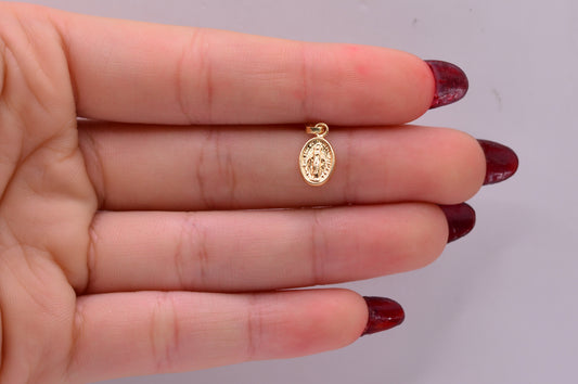Dije Virgen milagrosa / 0.35 Gr / 1.5 Cm / Oro amarillo 18k