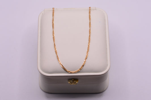 Cadena Singapur / 0.95 Gr / 45 Cm / 1.67 mm / Oro amarillo 18k / It