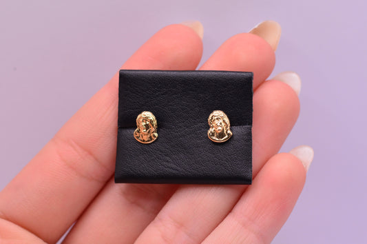 Topos Rostro de cristo silueta / 0.76 Gr / Oro amarillo 18k