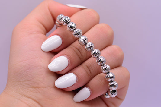 Pulsera tejida Bola junta balin blanco 7mm y 3mm / 4.24 Gr / Oro blanco 18k