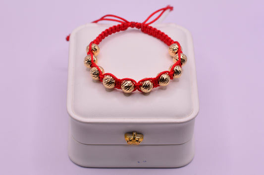Pulsera tejida Bola abrazada 8mm / 2.80 Gr / Oro amarillo 18k