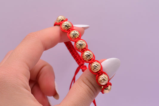 Pulsera tejida Bola abrazada 8mm / 2.80 Gr / Oro amarillo 18k