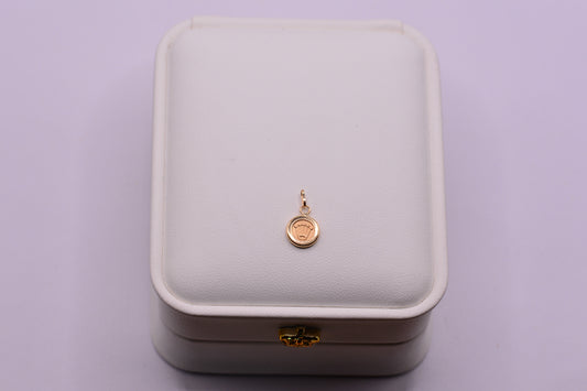 Dije Rx / 0.38 Gr / 1.3 Cm / Oro amarillo 18k