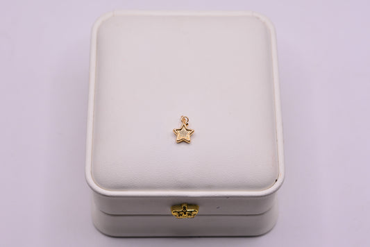 Dije Estrella diamantada / 0.20 Gr / 1.3 Cm / Oro amarillo 18k