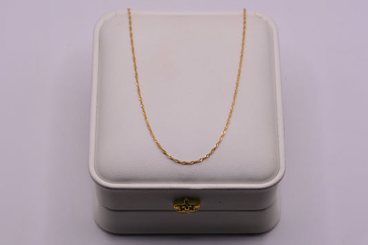 Cadena Singapur / 0.90 Gr / 50 Cm / 0,88 mm / Oro amarillo 18k / It