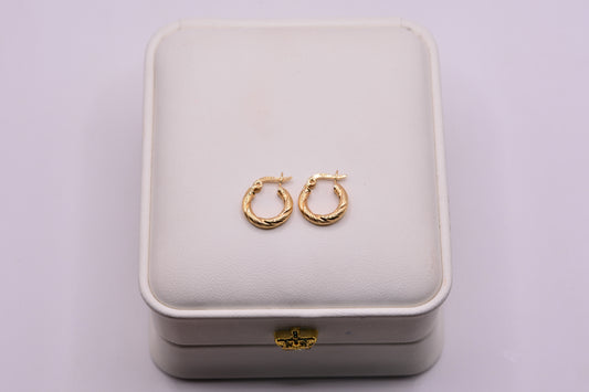 Candonga Entorchada aura / 1.00 Gr / 1.2 Cm / Oro amarillo 18k